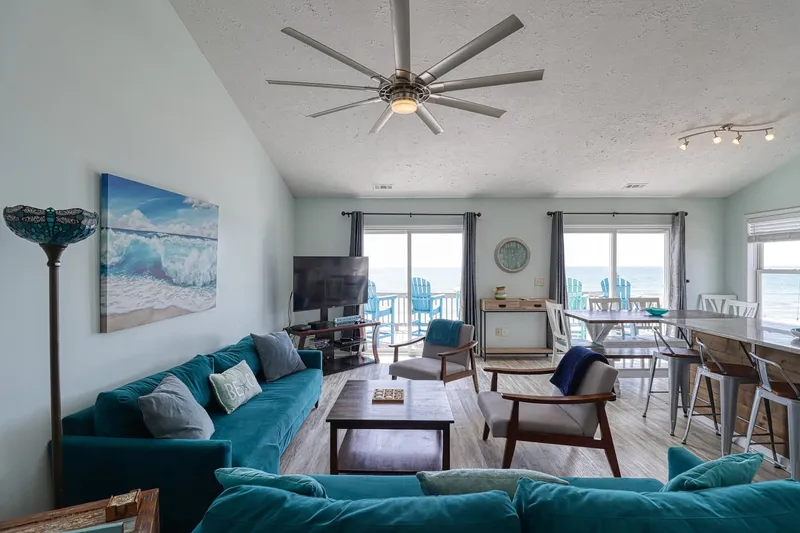 Living, Dining and Kitchen all enjoy the views!  Almost like being on a cruise ship.